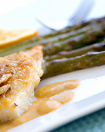 Zesty Baked Lemon Cod with Crispy Roasted Asparagus Delight