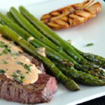 Savor Garlic Butter Steak with Crispy Asparagus Delight