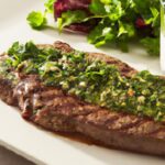 Savor the Flavor: Grilled Steak with Zesty Chimichurri Sauce