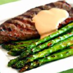 Savor Garlic Butter Steak with Tender Asparagus Delight